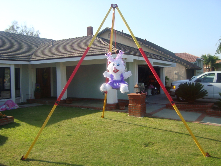 PiÃ±ata stand rental for parties in Austin Texas from Austin Bounce House Rentals