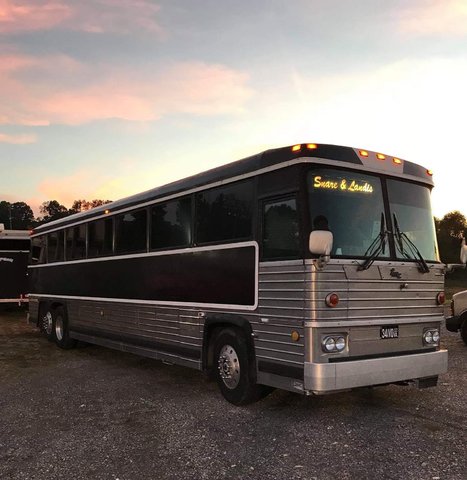 Snare & Landis and Tammy the Tour Bus