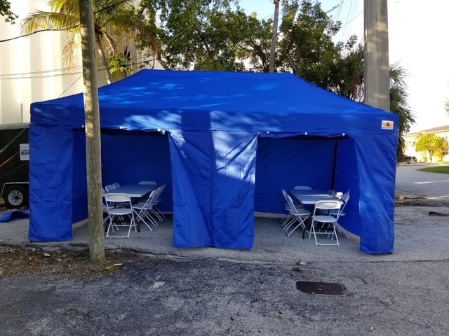 10x20 Blue tent with walls 3 tables and 30 chairs 10x20 Blue tent with walls 3 tables and 30 chairs