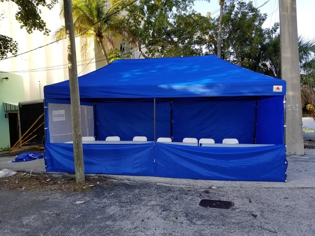 10x20 Blue Vender Tent with 6 tables and 12 chairs 10x20 Blue Vender Tent with 6 tables and 12 chairs