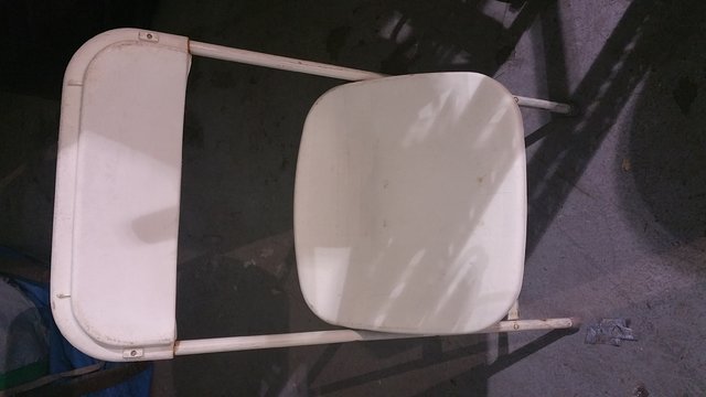 off white plastic chairs