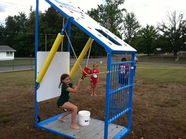 Water Wars station setup on grass by Austin Bounce House Rentals