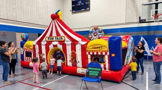 Carnival Toddler Playland inflatable rental in Austin Texas setup in a gym with kids playing.