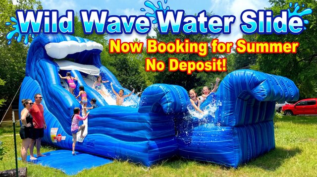 Wild Wave Water Slide setup outdoors with kids playing from Austin Bounce House Rentals™