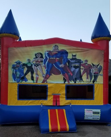 Large Bounce House with justice league banner 2