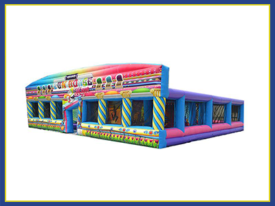 Angled view of the fun house maze. Colorful blend of secondary and primary color with a carnival theme design.