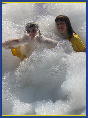 Kids playing in a foam pit.