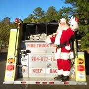 New Santa visits on a Fire Truck 