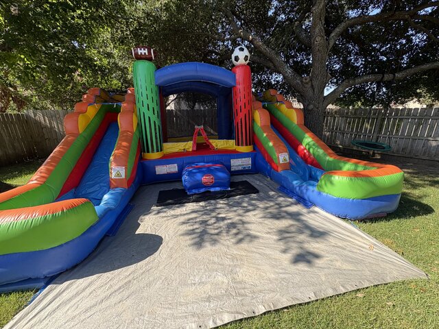 Sports Themed Bounce House with Dual Slides Sports Themed Bounce House with Dual Slides