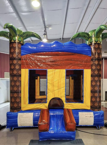 Tropical 2 basketball goals bounce house 