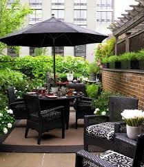 UMBRELLA BLACK WITH BLACK BASE AND TABLE $35