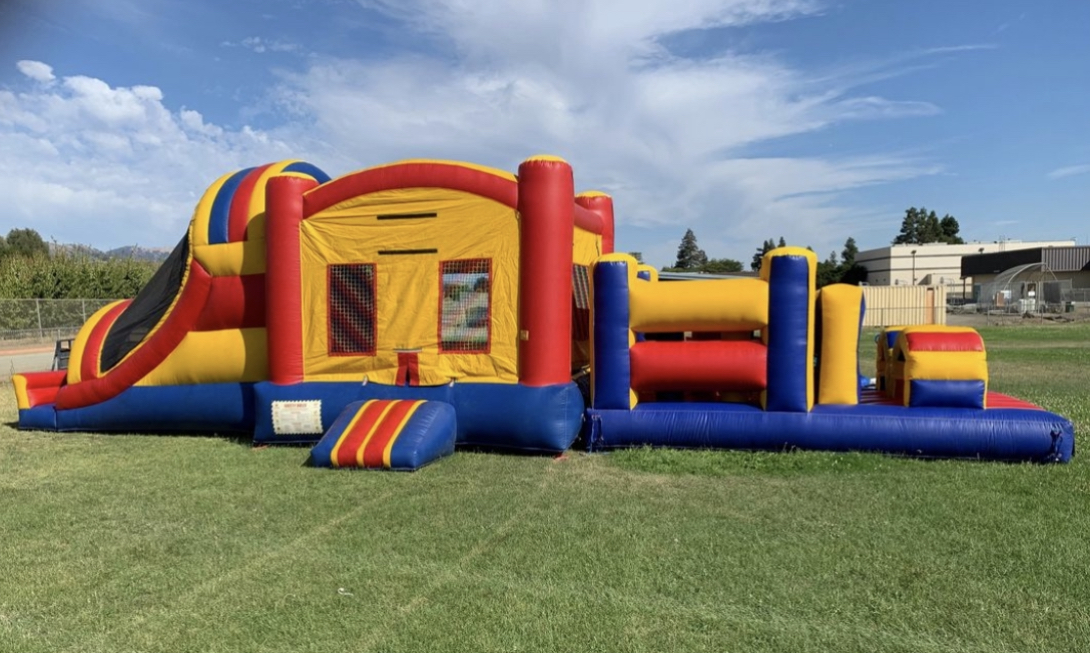 Dual lane bounce house obstacle course