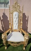 white and gold kings throne chair