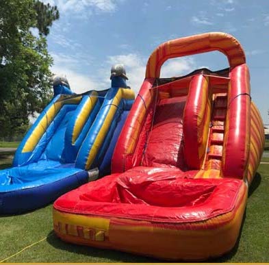 Inflatable water slide setup outdoors on a sunny afternoon