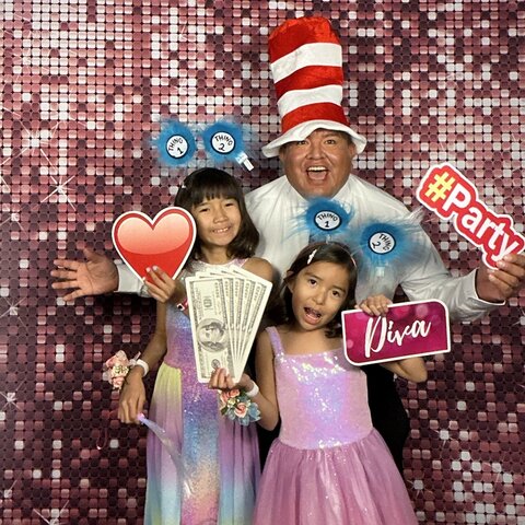 VIP photo booth attendant experience with props and guests in Goodyear Arizona