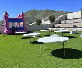 COMBO DEAL #1: Bounce house, 4 round tables, and 32 chairs 
