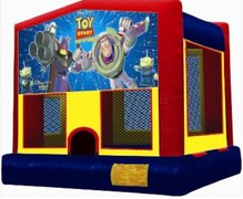 Toy Story Panel On A Red And Blue Bounce House / With Basketball Goal