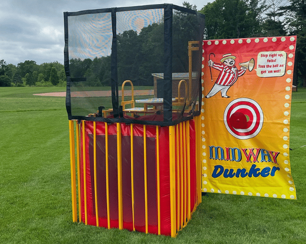Dunk tank set up in a baseball field