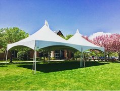 1 High Peak 40’ X 20’ Tent - Installed with Rain Gutters