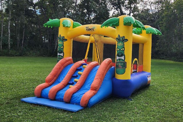 Tiki Island Bouncy Castle with slide Tiki Island Bouncy Castle with slide