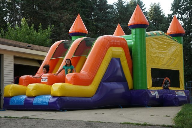 Double Slide Combo Wet and Dry Jump House Rentals Naperville offers a variety of inflatable house rentals, including Moon Jumps, Moonwalks, and water slides