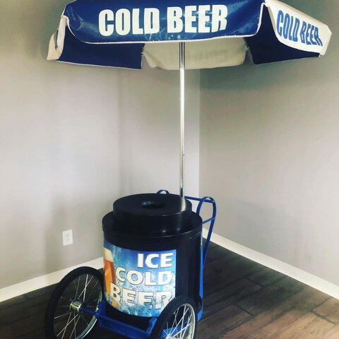 Rolling beverage cart with cooler and umbrella Rolling beverage cart with cooler and umbrella
