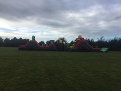 84' 2pc tropical falls obstacle course w. 16' double lane slide 84' 2pc tropical falls obstacle course w. 16' double lane slide