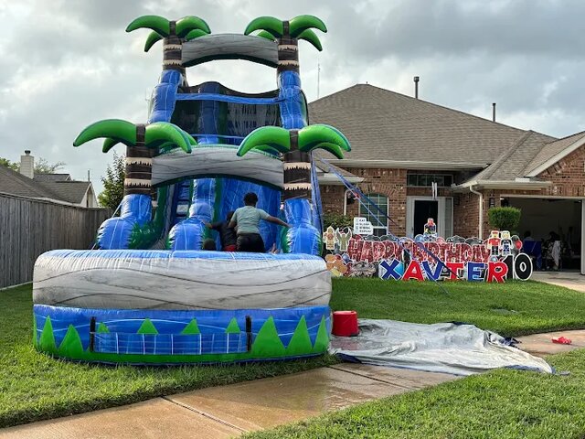 Making a splash and having a blast! 🌊🎉 It's all about fun in the sun with this epic water slide adventure! 🏖️💦