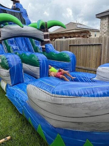 🌊💦 Summer fun in the backyard! Nothing beats a slide and some splash time!