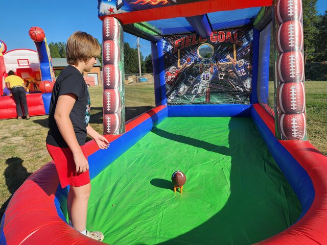 Kicking punting inflatable football game
