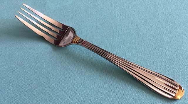 DINNER FORK WITH GOLD ACCENTS