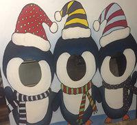 christmas-photo-stand-in-kids-penguins-starting-at