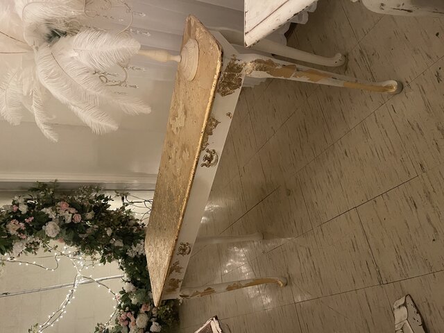 Gold Leaf Sign In Table