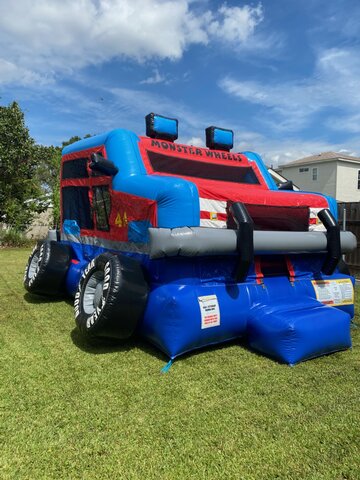 A Monster Truck Inflatable Bounce House Camo