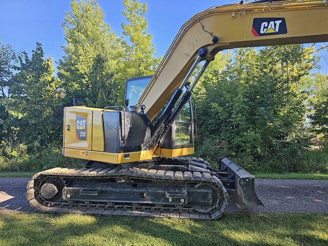 Cat 310 Excavator Monthly