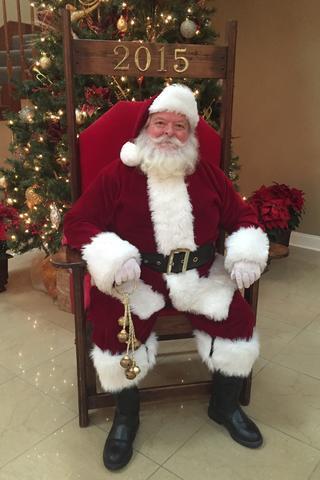 Santa Claus with Giant Santa Chair*