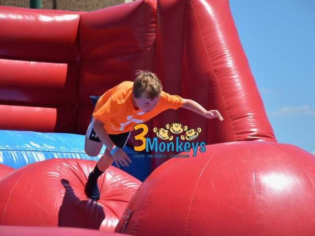 Big Red Baller Interactive Game Rental - 3 Monkeys Inflatables