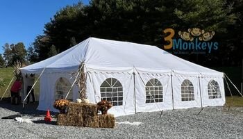 20x40 Canopy Tent with Sidewalls for Rent Asphalt Setup 3 Monkeys Inflatables