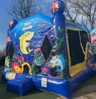 Tiny Shark Bounce House for rent feature challenge is jam-packed with fun, offering a generous area of jumping area, basketball hoop, climb and slide.ÃÂÃÂÃÂÃÂÃÂÃÂÃÂÃÂ Bright and lively this Kids Jump unit offers more fun per square foot than any other! These units are rented fron Kids Jump Illinois