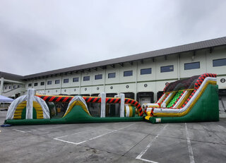 70 foot Amazon Rush obstacle featuring 22 ft. Rock Climb and Double slide