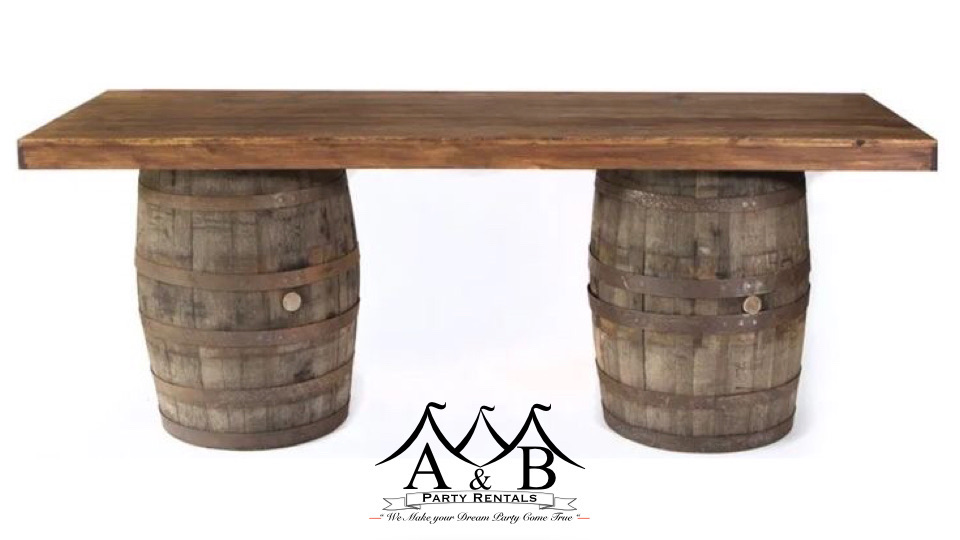 Wooden barrels available for rent. The image showcases rustic wooden barrels that are ideal for event rentals, adding a charming touch to various occasions. These versatile wooden barrels are offered for rent by A&B Party Rentals in Salisbury, MD.