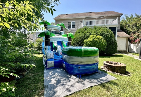 A&B Party Rentals inflatable tropical water slide setup