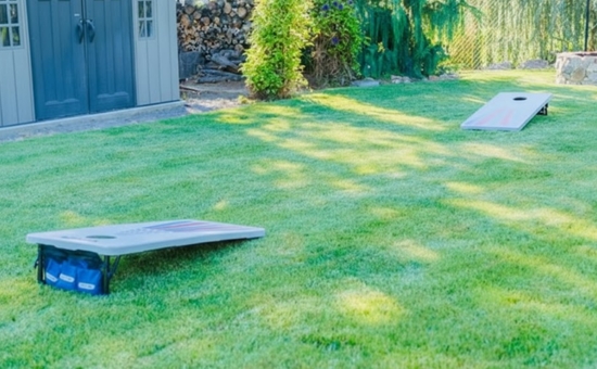 A&B Party Rentals cornhole lawn game setup outdoors