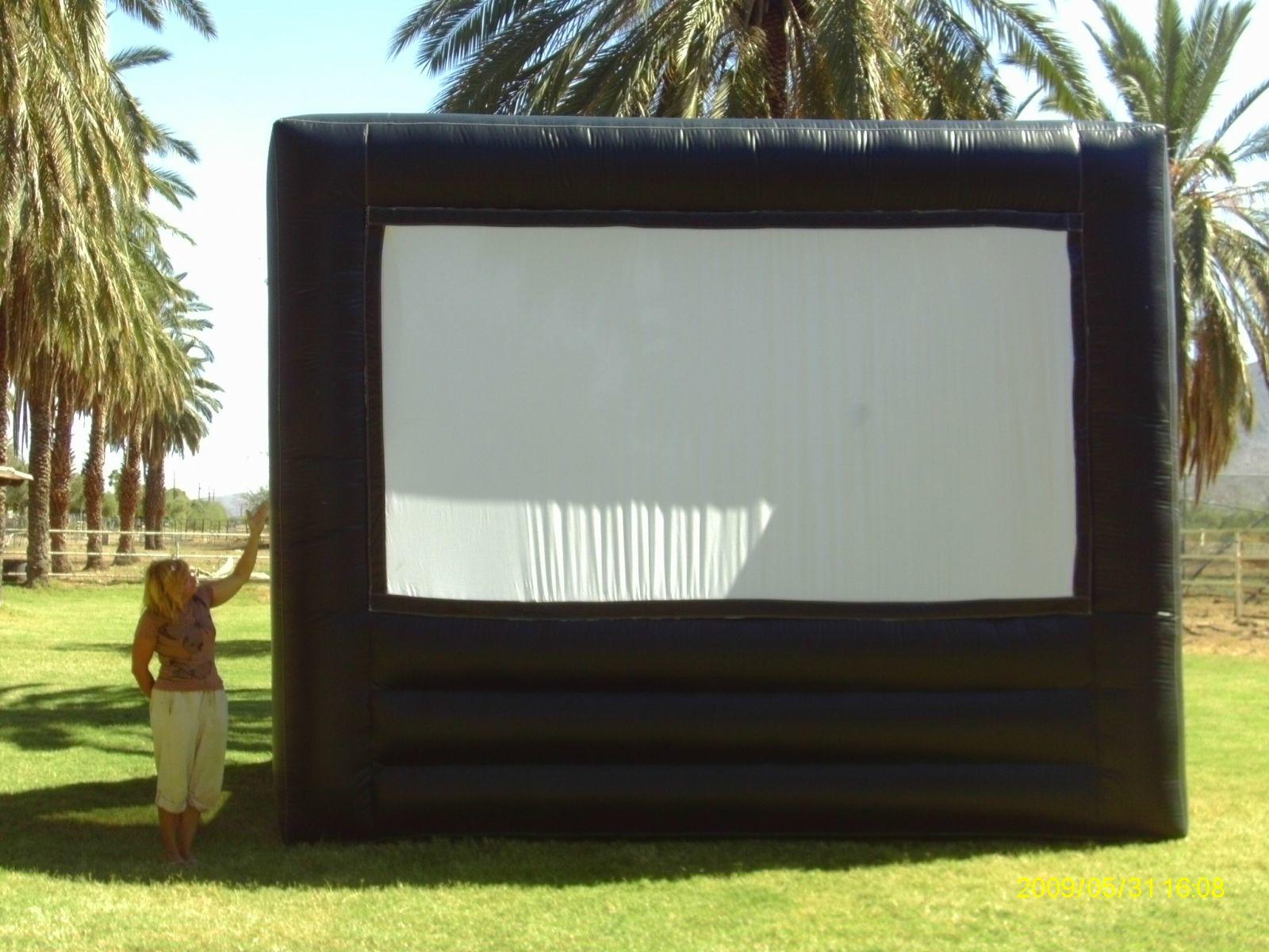 Giant Movie Screen and a variety of Carnival Rides and Bouncers