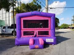 Purple and pink bounce house with hoop Purple and pink bounce house with hoop