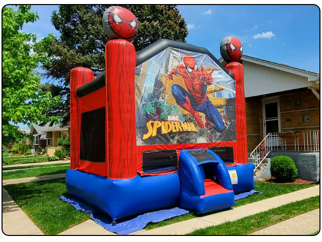 Spiderman bounce  house in small Chicago front yard