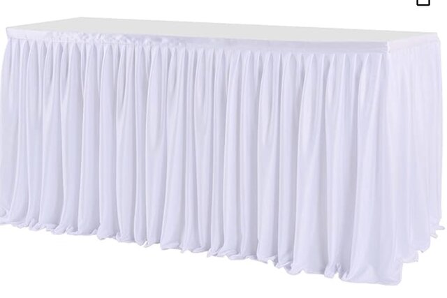 white rectangular table skirt