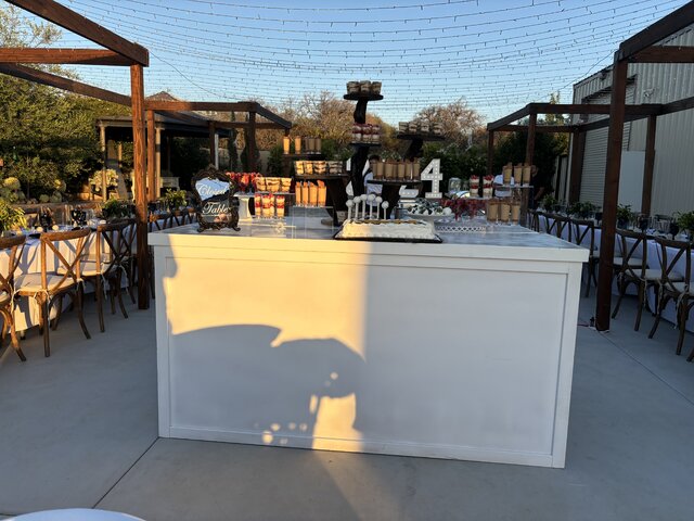 white bar with drink shelf