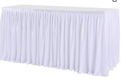 white rectangular table skirt