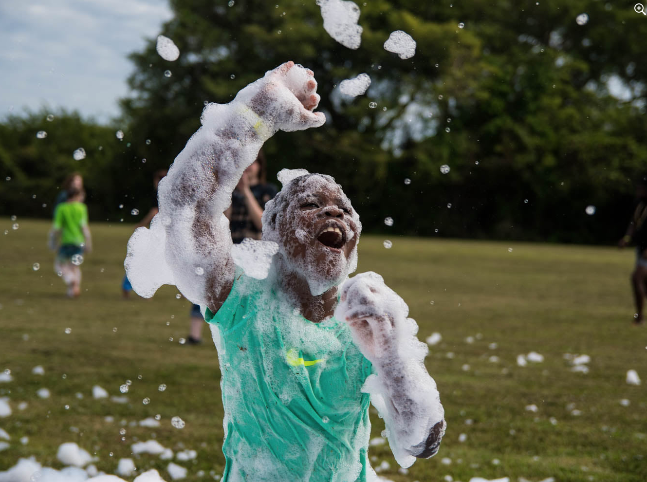 Kids playing in foam at a foam party in Cartersville GA